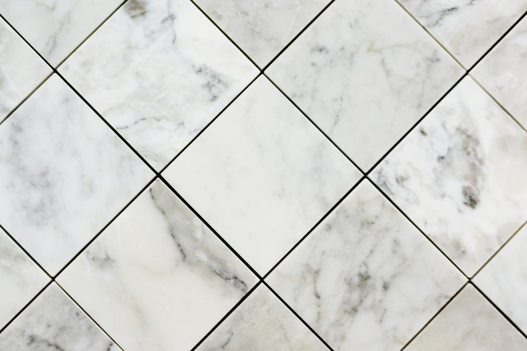 An image of close up of marble textured tiles put on by Palouse Floors